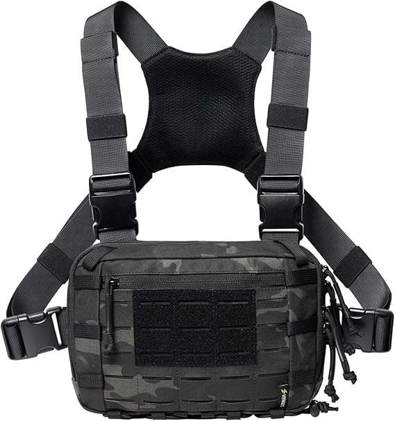 Black tactical vest with multiple straps and pockets on a white background